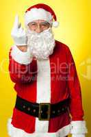 Angry Santa showing middle finger