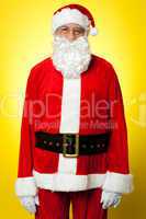 Isolated aged male dresses in Santa attire