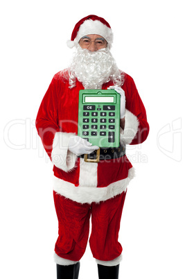 Old man dressed as Santa showing a large green calculator