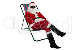 Santa wearing shades and striking stylish pose