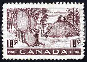 Postage stamp Canada 1950 Indians Drying Skins on Stretchers
