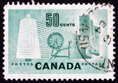 Postage stamp Canada 1953 Bobbin, Cloth and Spinning Wheel