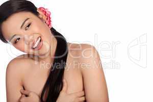 Laughing Asian girl posing topless