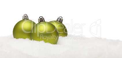 Green Christmas Ornaments on Snow Flakes Isolated on White