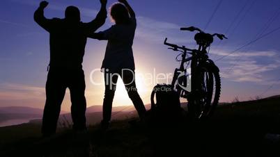 Dancing, Sunset silhouette