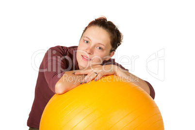 Beautiful woman with a pilates ball