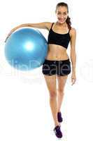 Young healthy lifestyle woman with pilates exercise ball