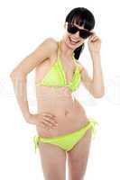 Beautiful young woman wearing green bikini