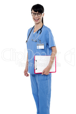 Duty doctor posing with case sheet in hand