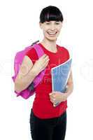 Charming young teenage girl ready to attend college