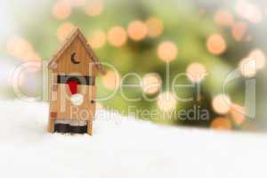 Santa in An Outhouse on Snow Over and Abstract Background