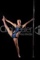 Young pole dance woman in costume