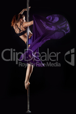 Pole dance woman with purple fabric