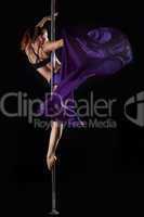 Pole dance woman with purple fabric