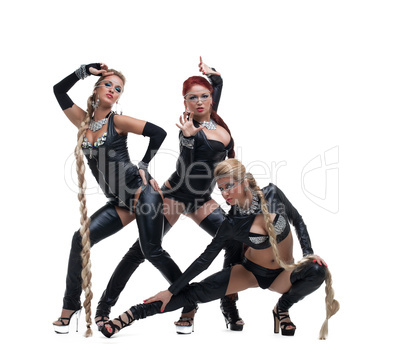 Young dancers in black bdsm latex costumes