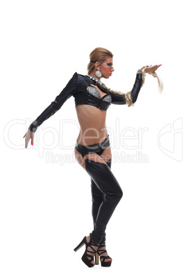 Sexy dancer in latex costume with braid