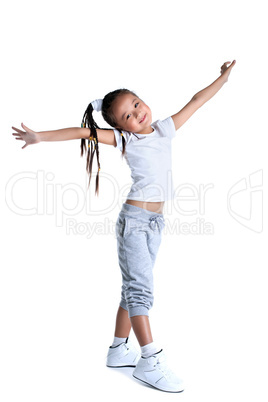 Happy asian little girl in sportswear