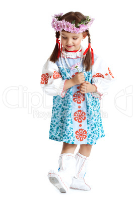 Pretty little girl in slavic costume isolated