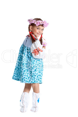 Cute little girl in blue slavic costume