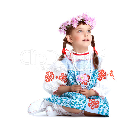 Beautiful little girl in blue slavic costume