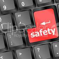 safety first concept with red key on computer keyboard