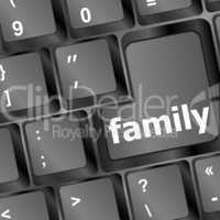 computer keyboard with family button - social concept