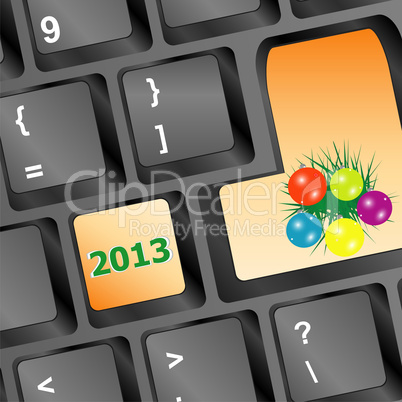 christmas button with balls and fir on keyboard