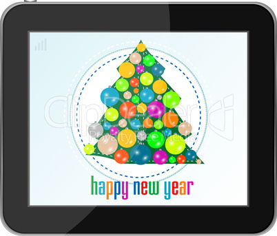 christmas tree with balls on tablet pc