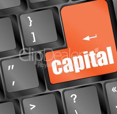 capital button on keyboard - business concept