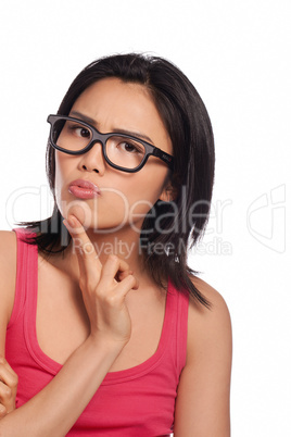 Thoughtful Asian woman in glasses