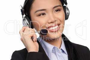 Smiling Asian call centre operator