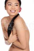 Beautiful Asian woman posing topless