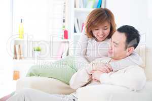 Asian couple having sweet talk