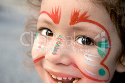 Little Girl With Face Paint Looking Up