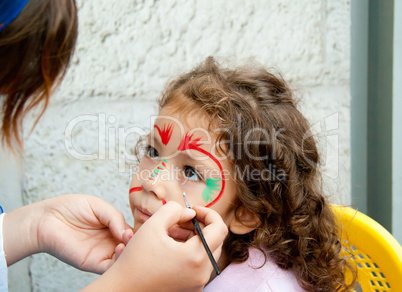 Little Girl Getting Her Face Painted