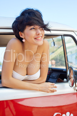 a beautiful young girl with short hair cut and blue eyes