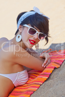 a beautiful young girl in retro look with red lips