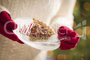 Woman Wearing Red Mittens Holding Plate of Pecan Pie, Peppermint