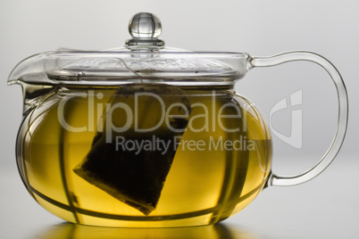 Glass tea pot with tea bag