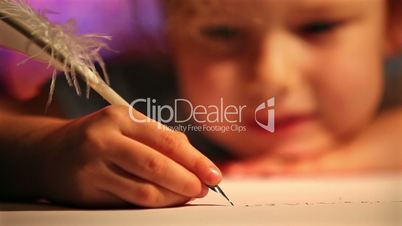 Girl writing with quill pen. Xmas concept