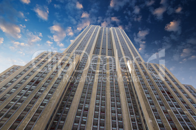 NEW YORK - FEB 22 : Empire state building facade against dramati