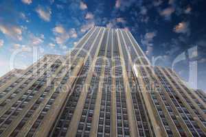 NEW YORK - FEB 22 : Empire state building facade against dramati