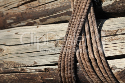 Planks of wood bound by ropes.