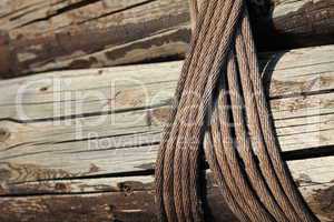 Planks of wood bound by ropes.