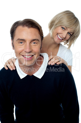 Love couple posing casually in front of camera