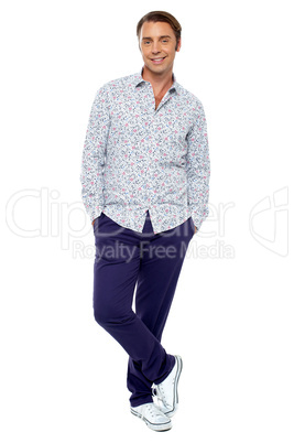 Calm and relaxed middle age man posing casually