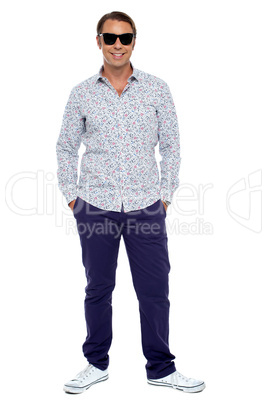 Stylish middle aged man posing in casuals