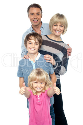 Group portrait of a playful family of four