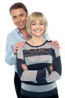 Lovely young couple portrait against white background