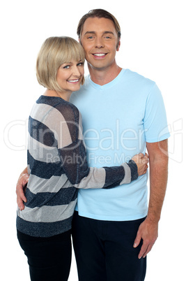 Charming middle aged lady embracing her husband